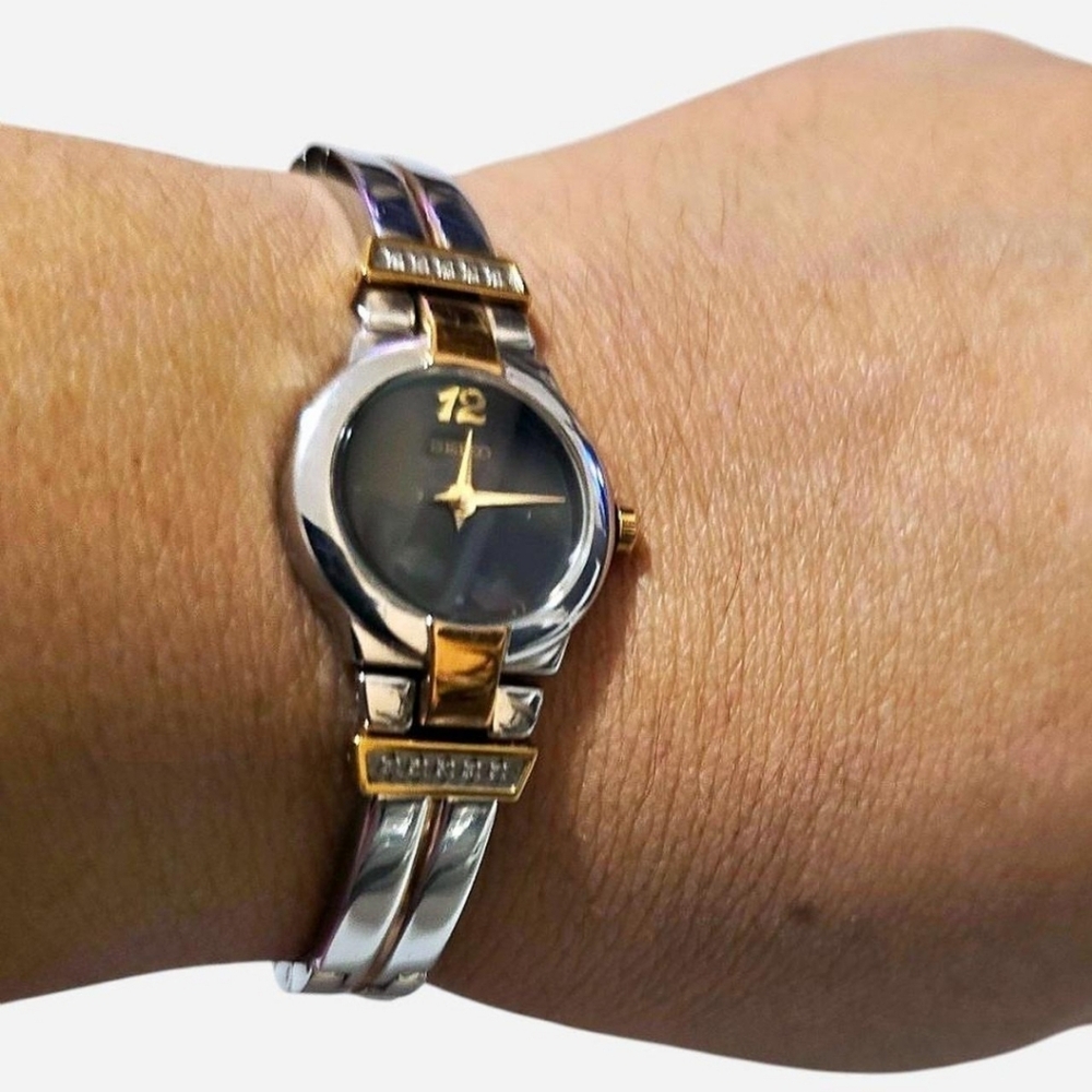 Seiko Gold and Silver Watch with Black Dial